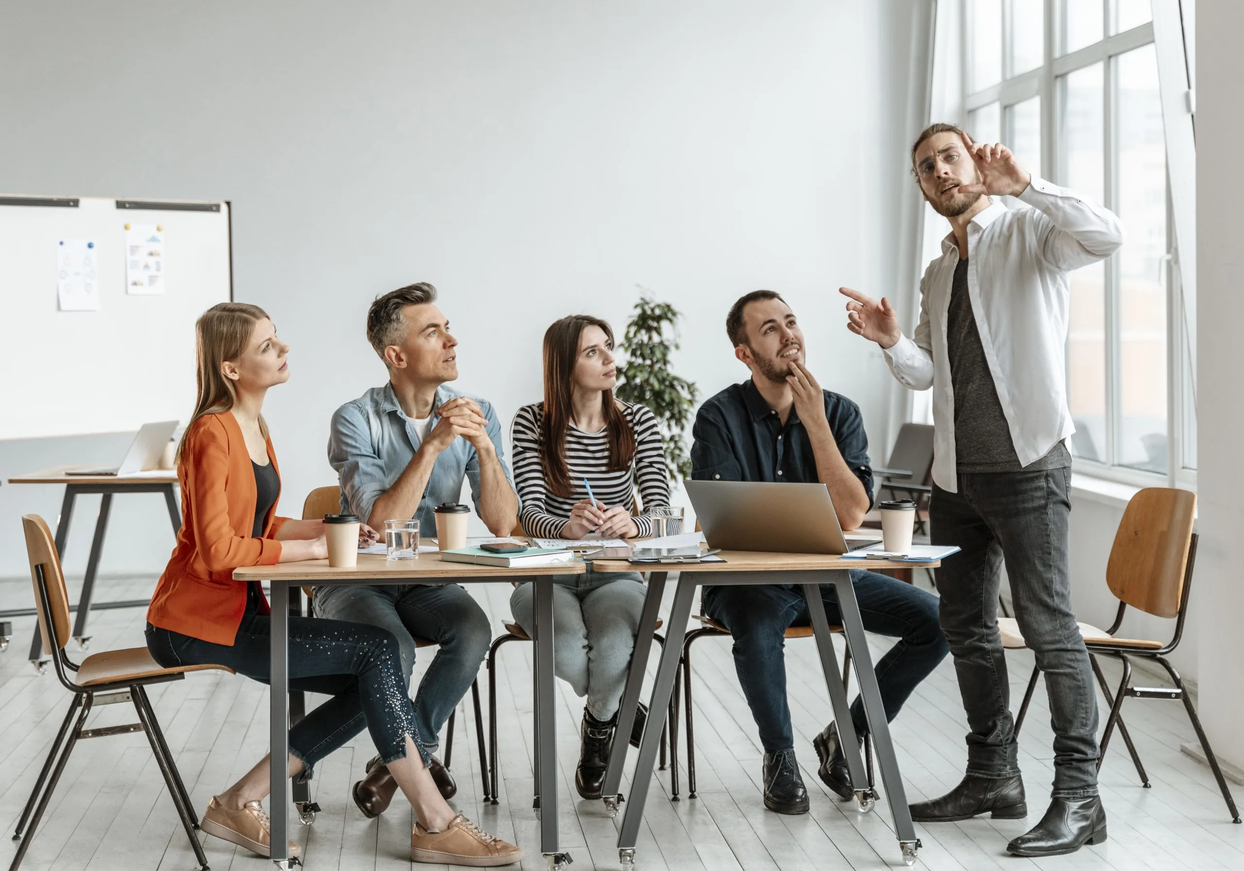 ONEROAD Media team collaborating in a modern office