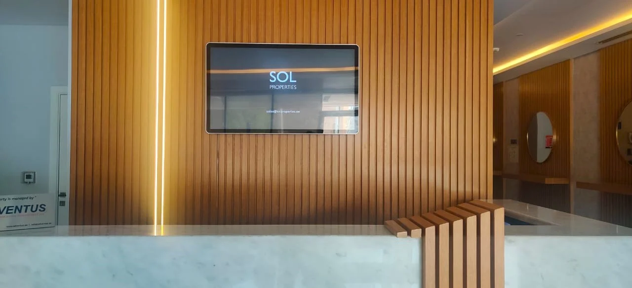 Vertical digital billboard in station